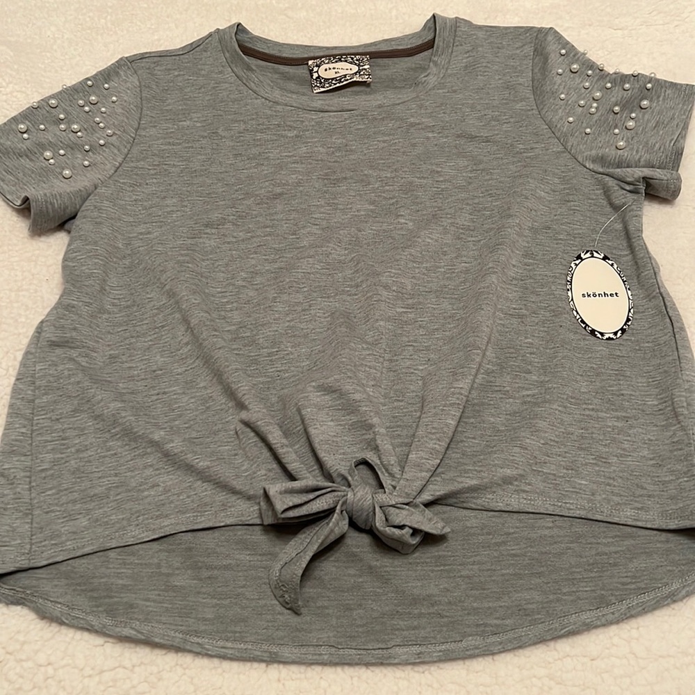 Gray shirt with faux pearl cap sleeve details.